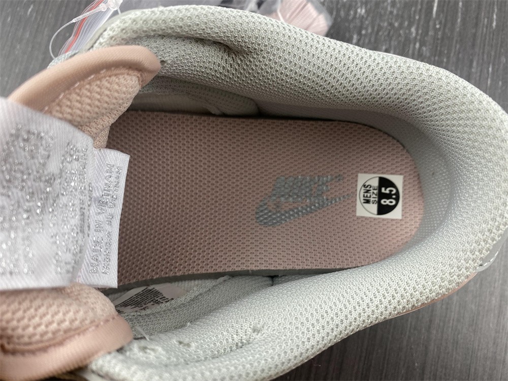 from SB Dunk Low Pink/Grey DM8329-600